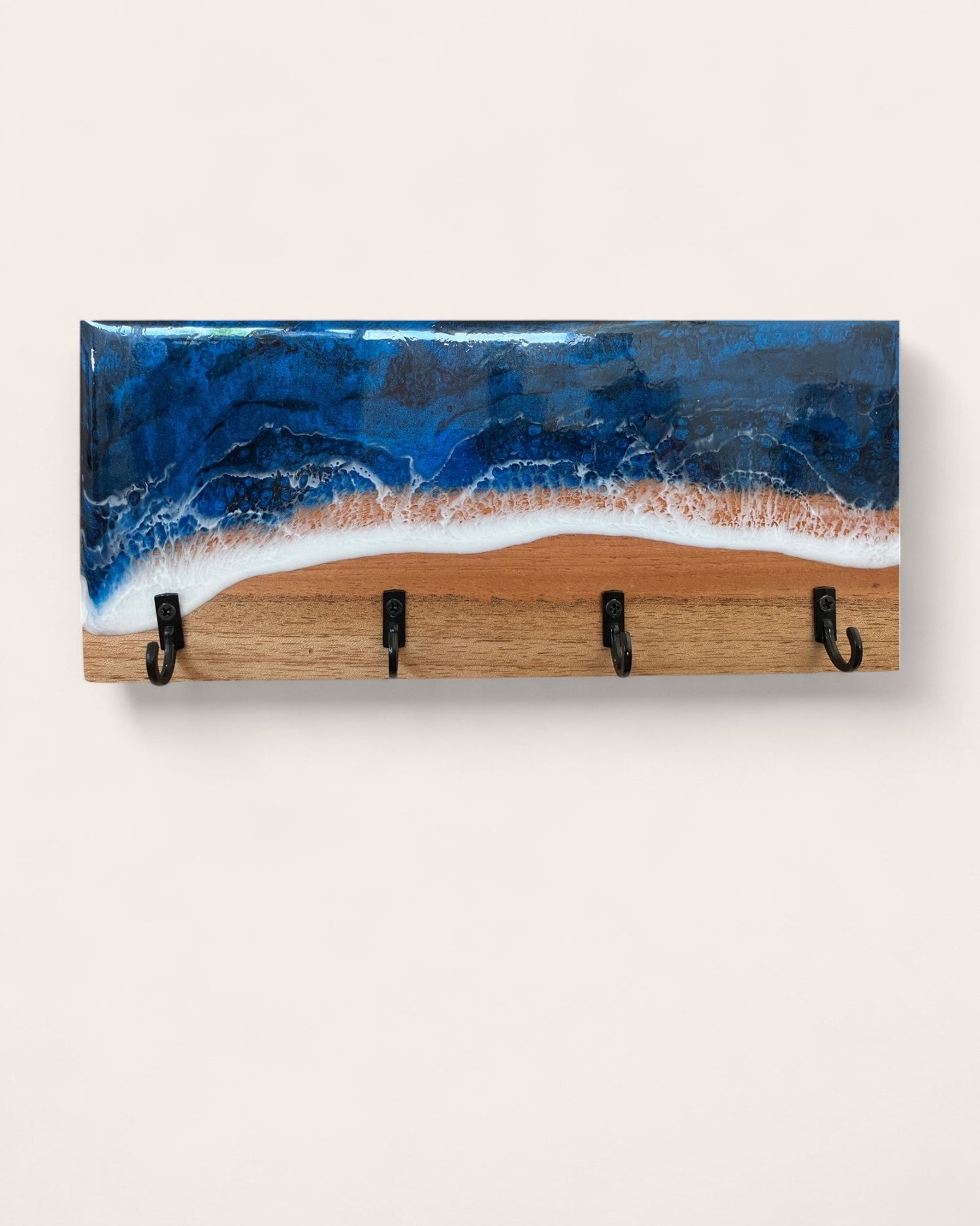 Wood and resin key holder displayed with keys and resin keychains